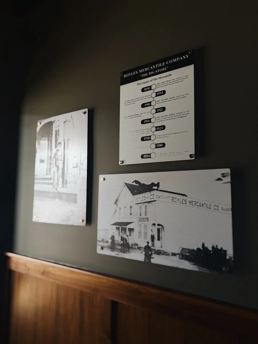 Historical Mercantile photographs and signage displayed in the restaurant